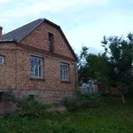 Цегляний будинок на Малорівненський